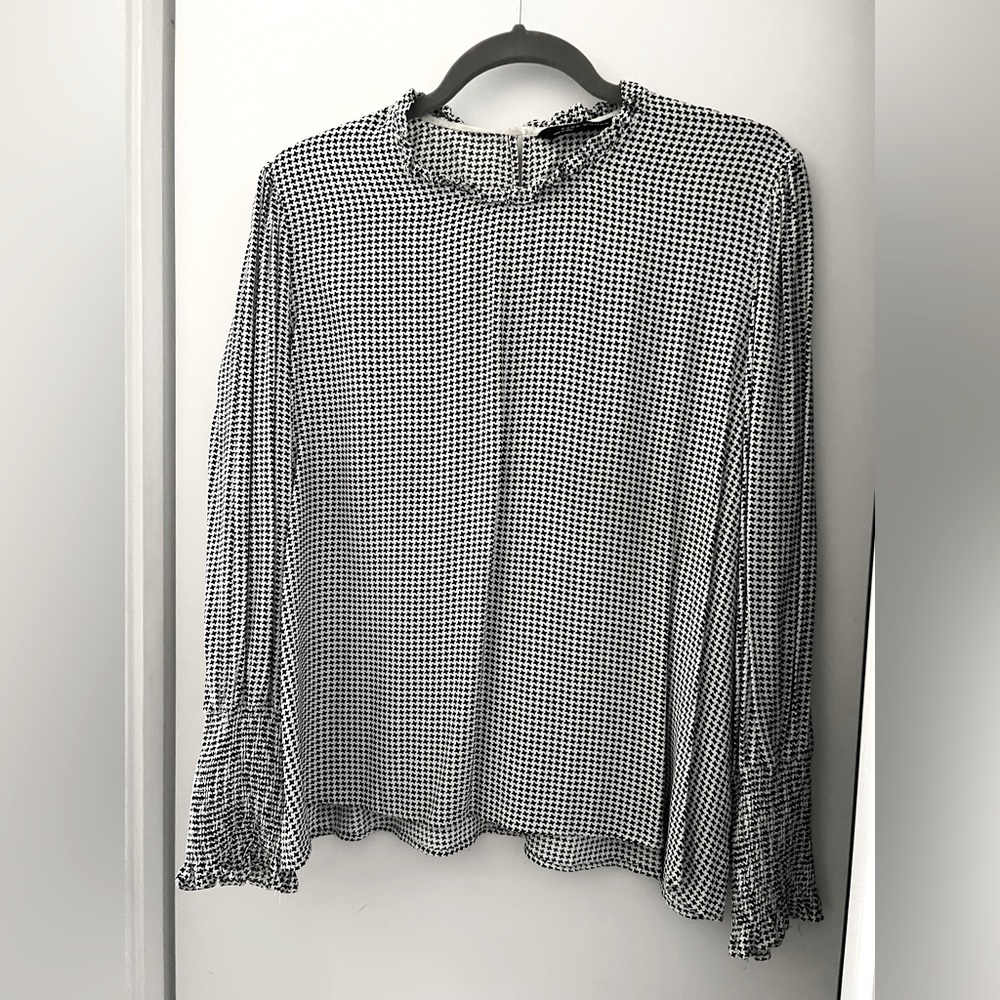 Zara Black and white patterned blouse.